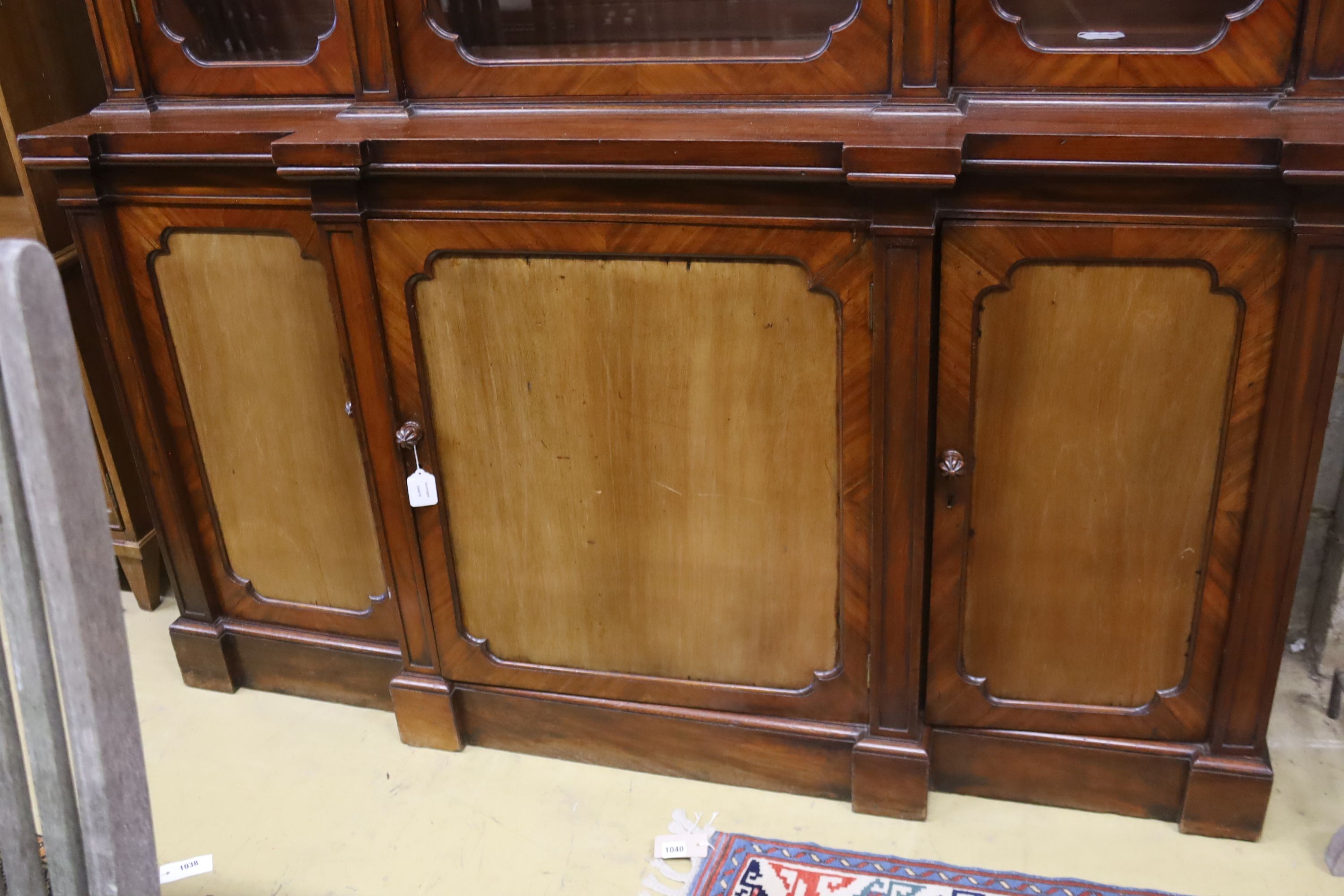 A Victorian mahogany breakfront bookcase, length 168cm, depth 46cm, height 217cm